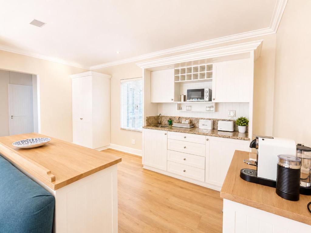 Kitchenette and coffee station at Tremezzo Plett