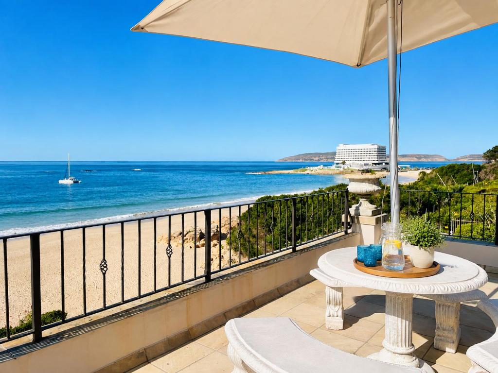 Balcony table overlooking Beacon Island and Central Beach